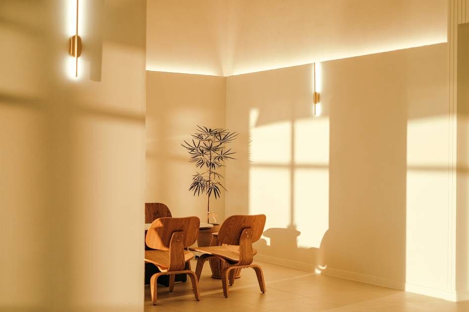 Cozy dining area showcasing warm recessed ceiling lights