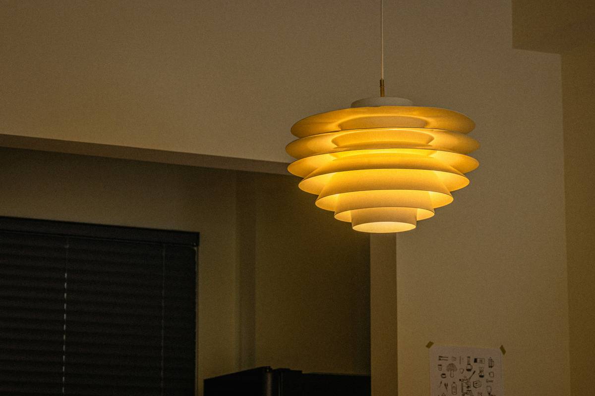 Close-up of high-quality recessed lighting fixtures with adjustable trims and smooth beam spread in a cozy living room